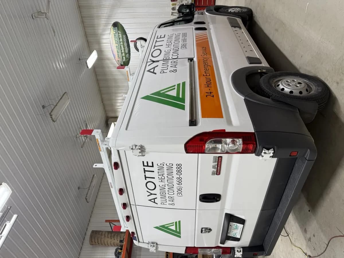 Van vinyl branding for Ayotte Plumbing, printed by True Color Saskatoon