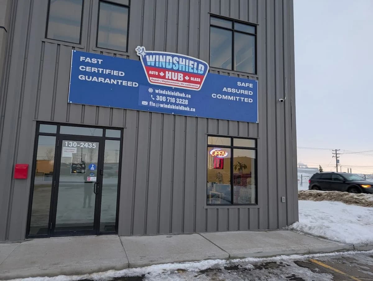 Windshield Hub exterior building banner installed in Saskatoon