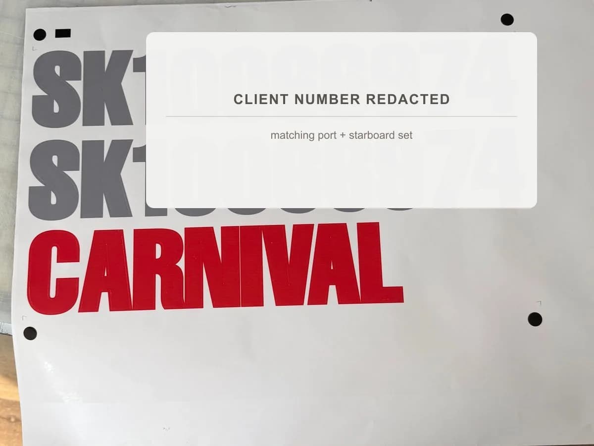 Die-cut SK boat licence number decals and a red boat name decal on premask transfer tape