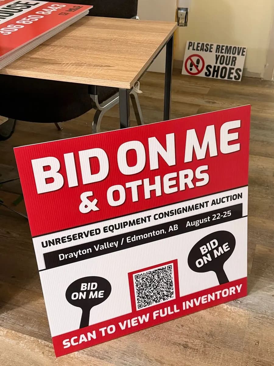 Bid On Me equipment auction coroplast signs with QR codes printed in Saskatoon