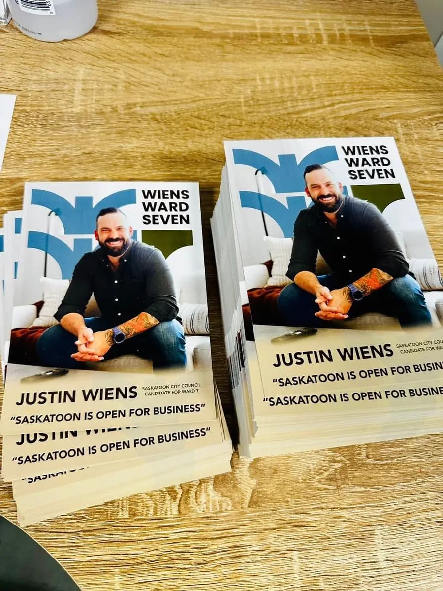 Election campaign flyers printed in bulk stacks by True Color Saskatoon