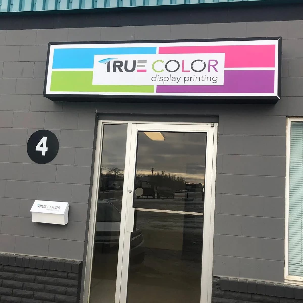 True Color Display Printing storefront and lightbox sign in Saskatoon