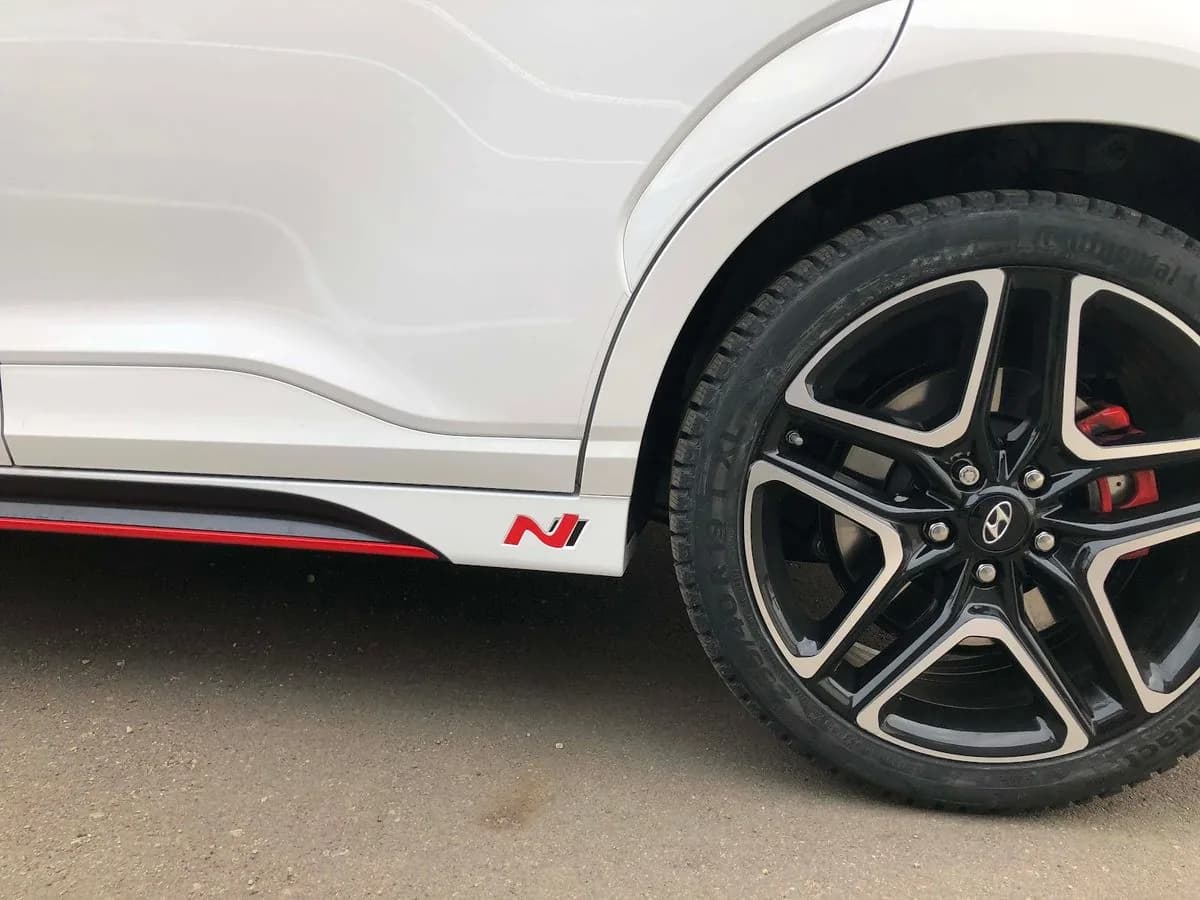 Red accent vinyl stripes installed on Hyundai N in Saskatoon