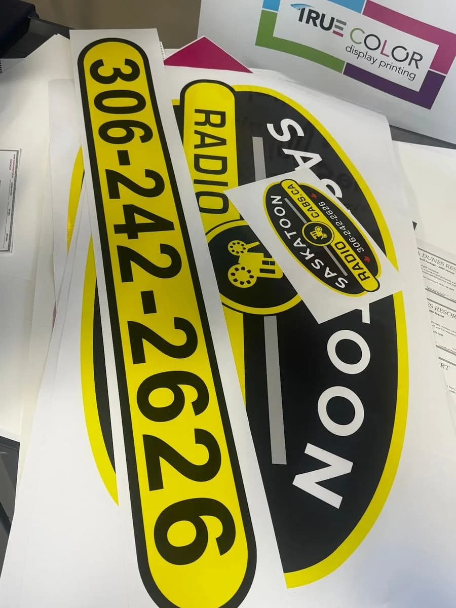 Saskatoon Radio Cabs oval vehicle door decals printed by True Color