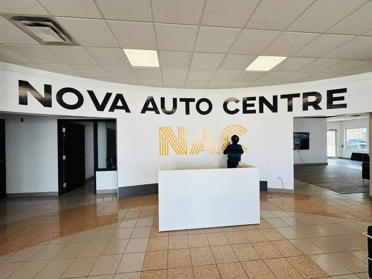Nova Auto Centre interior wall vinyl lettering installed in Saskatoon